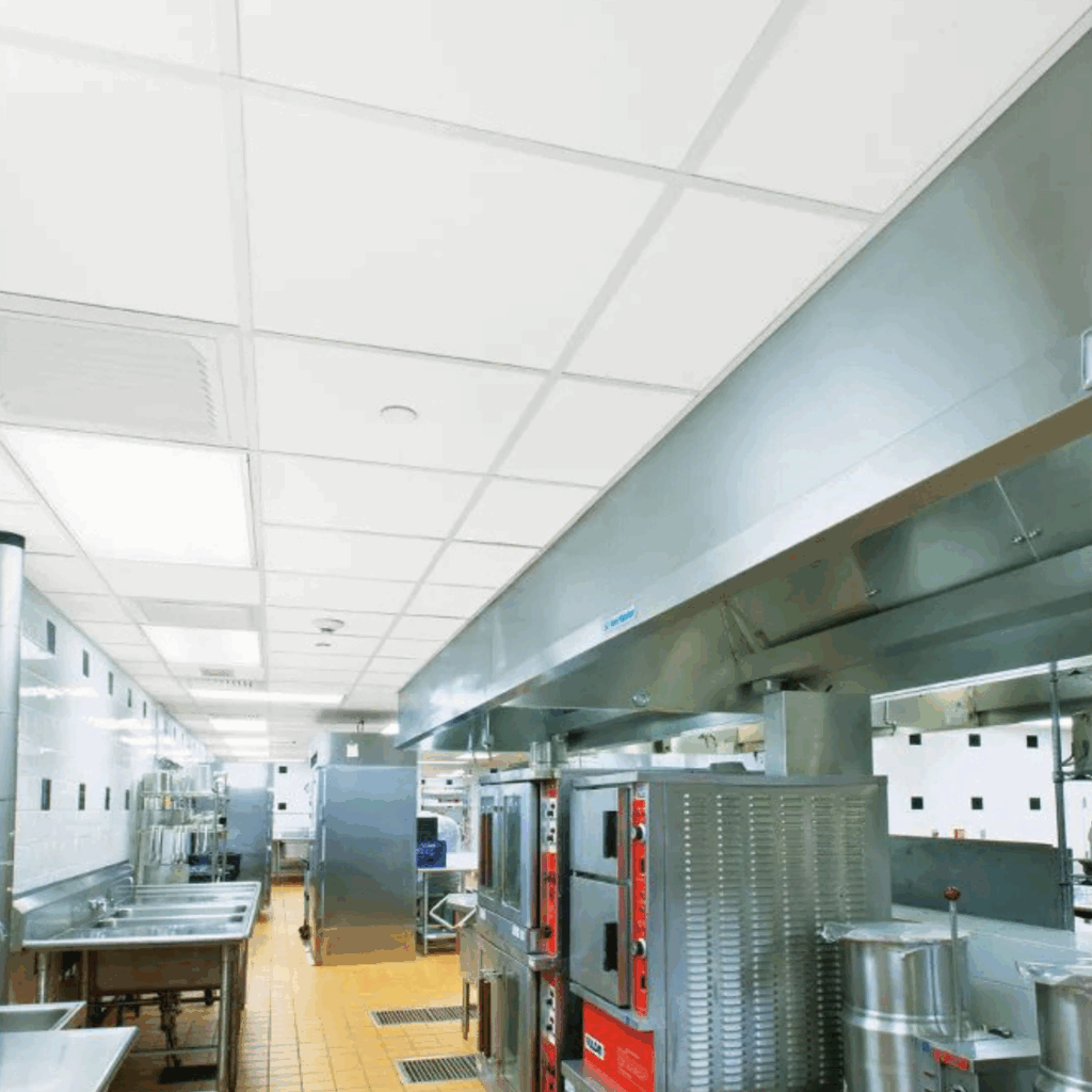 Fire-rated ceiling tiles in commercial kitchen for safety compliance