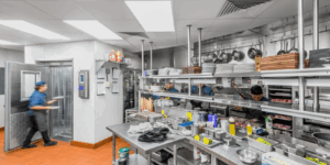 Restaurant kitchen with sanitary ceiling tiles and stainless steel equipment